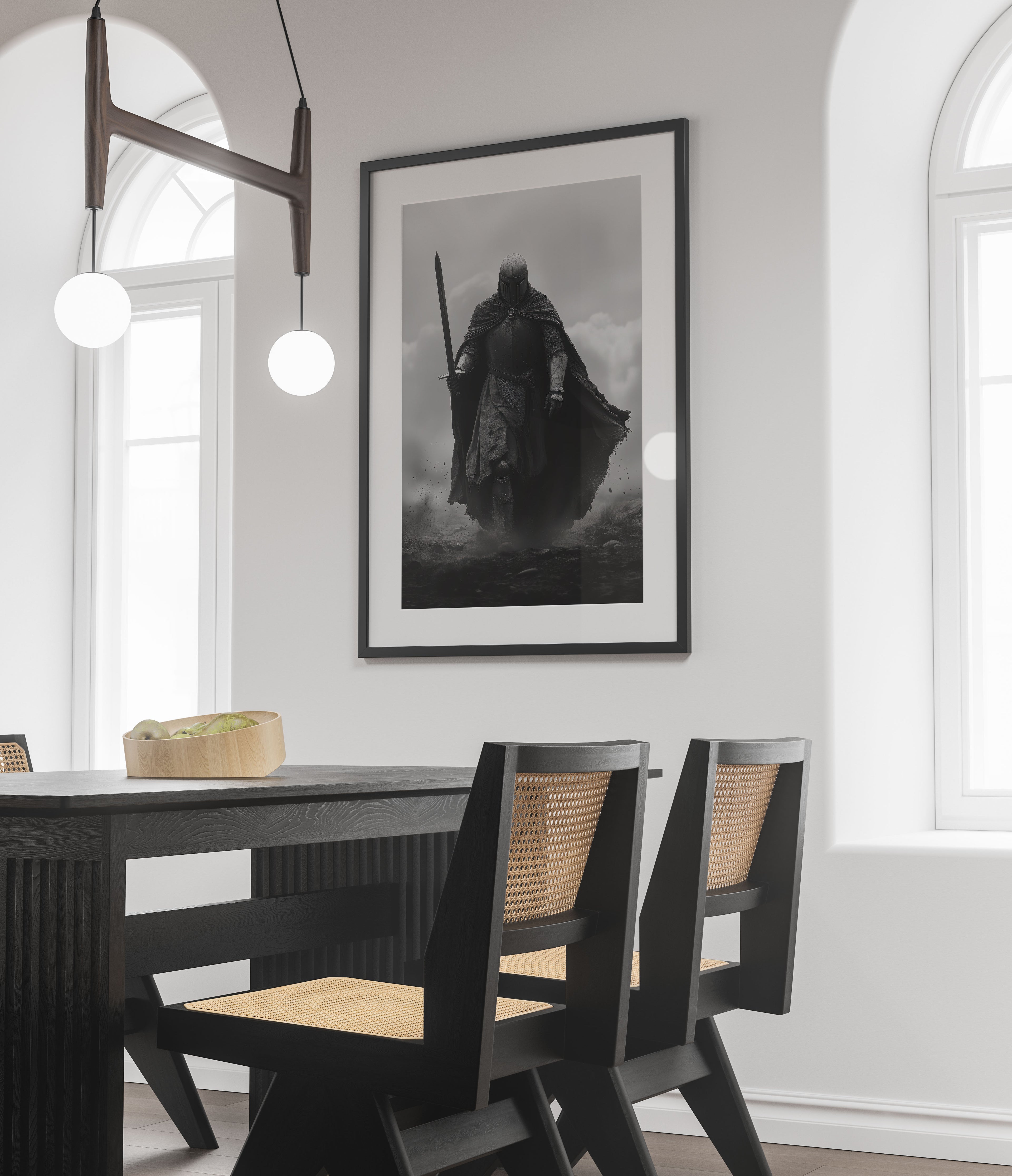 Dining room with a black and white framed artwork of a knight on the wall above a table and chairs.