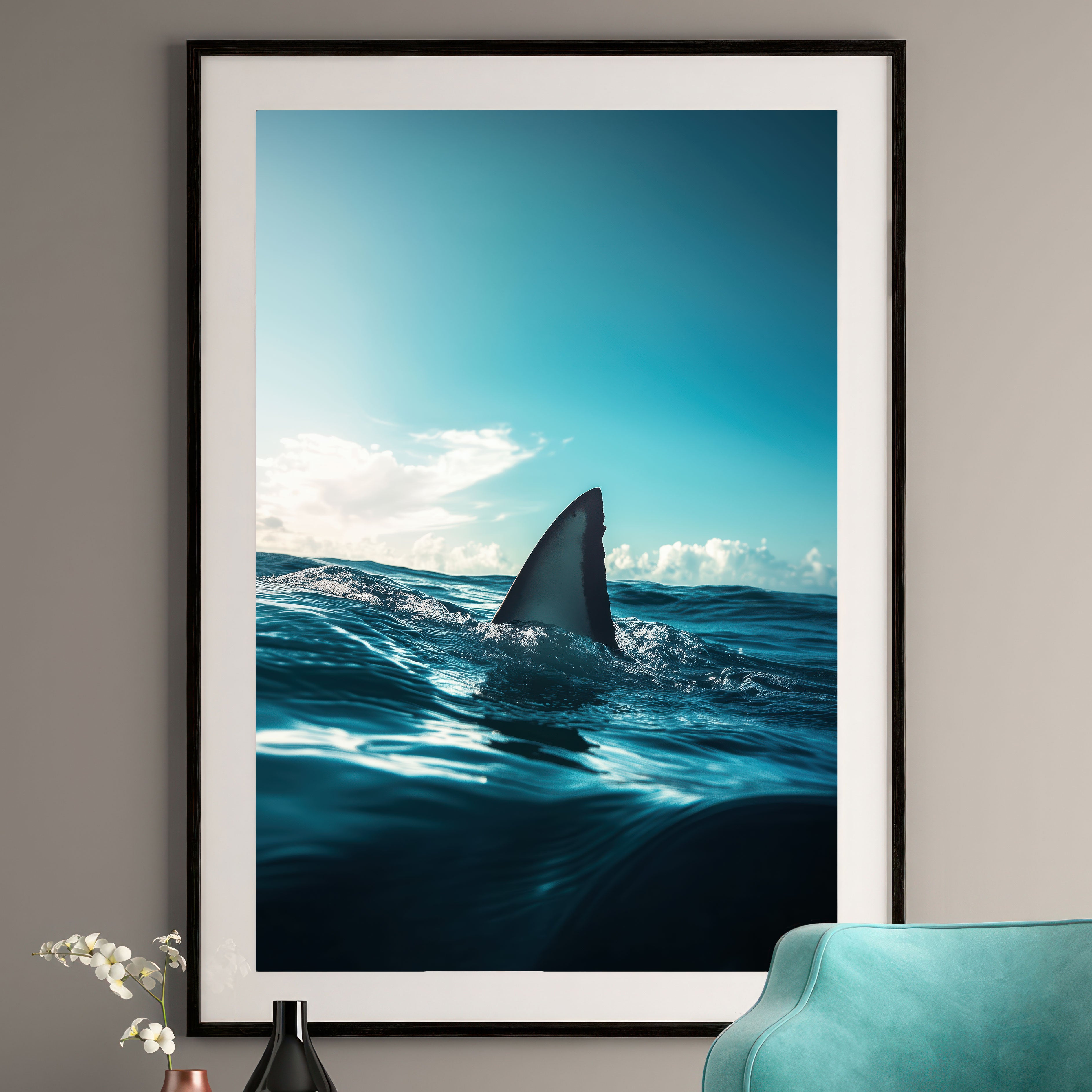 Framed shark fin wall art showing a shark fin emerging from ocean waves under a blue sky